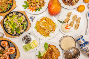 Top view image of Chinese food dishes. Lemon Chicken, Pekin Duck, Chinese Rice Pasta, Stuffed...