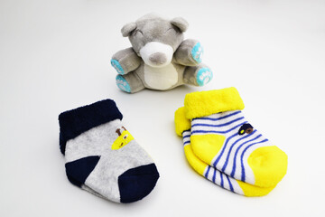 Baby socks isolated on white background. Newborn Baby Socks. Pair of small baby socks, baby shower,...