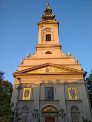 A fragment of a Christian church with archangels above the entrance