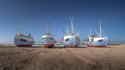 Naklejka premium Fishing boats on the beach in Denmark Thorup Beach