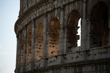 Fototapeta premium Sunny day in Rome. Colosseum. Aqueduct in Italian architecture
