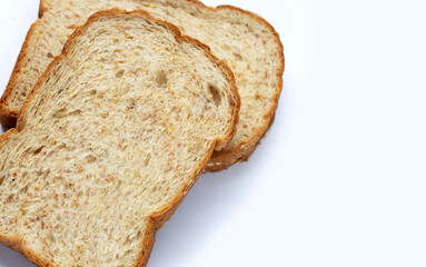 Sliced wholegrain bread on white background.