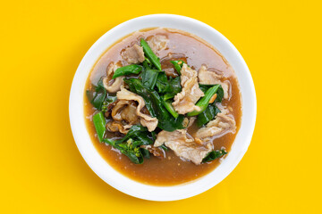 Fried flat noodle with pork and kale in gravy sauce