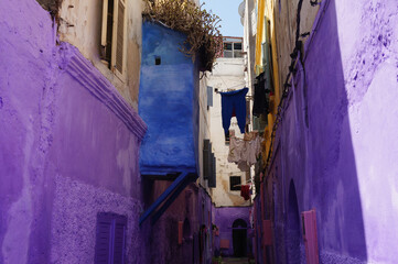 Short dead-end street (cul-de-sac) in the Old Medina, painted purple. Casablanca, Morocco.