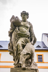 Obraz premium Kuks, Czech republic - May 15, 2021. Statue of vice - symbol of Overeating - Gluttony