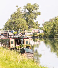 Front on view of a pretty narrow boat or canal boat moored on the Gloucester Sharpness Canal in the...
