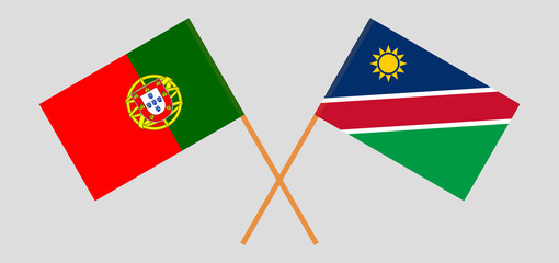 Crossed flags of Portugal and Namibia. Official colors. Correct proportion