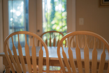 Obraz na płótnie Canvas Dining room table and chairs