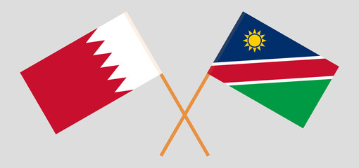 Crossed flags of Bahrain and Namibia. Official colors. Correct proportion
