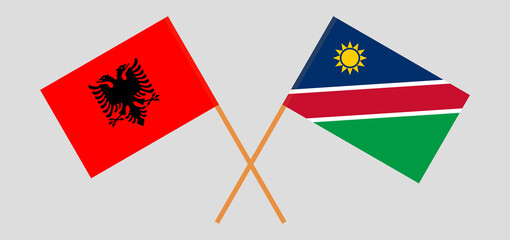 Crossed flags of Albania and Namibia. Official colors. Correct proportion