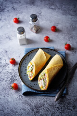 Corn tortilla with chicken and vegetables in a plate