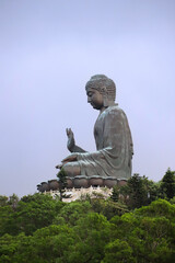 Huge statue of buddha on a hill