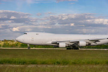 white cargo plane on the runway. without inscriptions and logos.