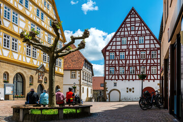 The town hall of Möckmühl , a town in the Heilbronn district in northern Baden-​Württemberg , is a half-timbered house from the late 16th century. - obrazy, fototapety, plakaty
