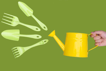 Set Concept of rural works, plant care, flower transplantation. Yellow metal watering can, a set of...