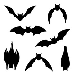 Black silhouette of a bat on a white in different poses.