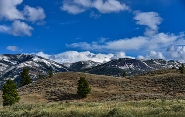 Wyoming Landscape, Mountains, Cloudy Sky, Grasslands