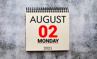 Obraz premium Wall calendar with a red pin - August 02