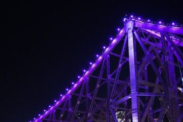 purple colours on bridge at night