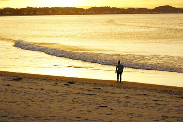 Fototapeta na wymiar walking on the beach