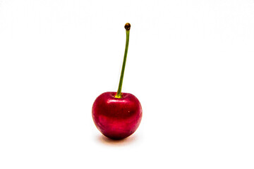 One red ripe cherry isolated on white background