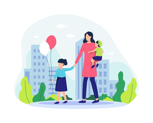 Mother and her children walking in the park