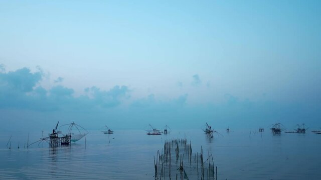 Fisherman's way of life in the morning with catching fish giant yor at Parkpra Phatthalung, Thailand