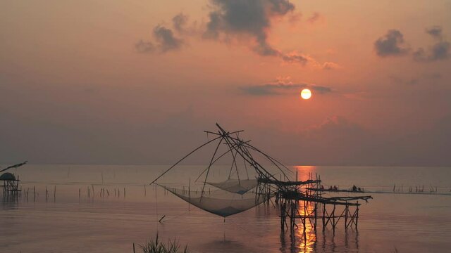 Fisherman's way of life in the morning with catching fish giant yor at Parkpra Phatthalung, Thailand
