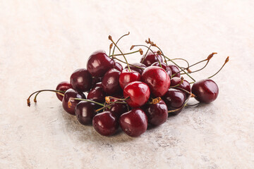 Ripe sweet cherry berries heap