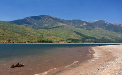 spectacular vallecito reservoir and surrounding mountain peaks on a sunny summer day in the san...
