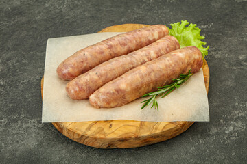 Raw pork meat sausages for grill