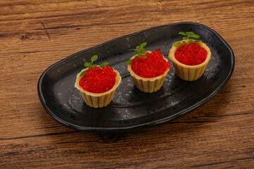 Apetizer - tartlet with red caviar