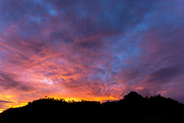 Shadows of mountains, evening sky, red-orange clouds, beautiful clear evening skies empty decks for the text above. image for background