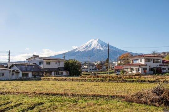 Yamanashi, Japan - The Fuji Mountain's view with blue clear sky take from Shimoyoshida station. This is shown the contry side living and rural culture style of Japanese with "Fuji-San" as a backgroud