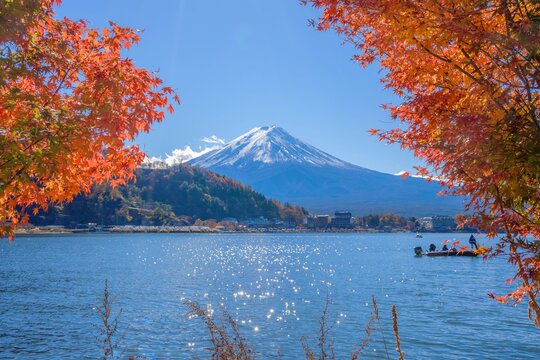 Mount Fuji in autumn which red maple and sun shine onto the lake with reflection on the lake Kawaguchiko.
This is very best scene and romantic place for tourist and couple for visit, famous tourist