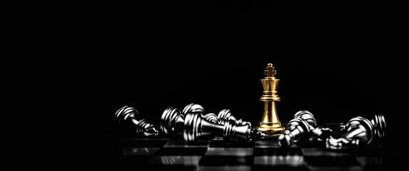 King chess standing to challenge battle fighting on chess board of business team and leadership...