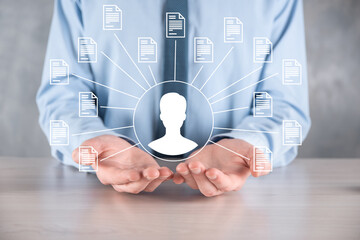 Document Management System DMS .Businessman hold user and document icon.Software for archiving,...