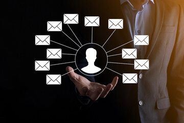 Male hand holding letter icon,email icons .Contact us by newsletter email and protect your personal...