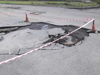 Crack on the road after a rainstorm.
