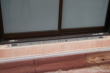 interdiction de s'asseoir french text means prohibition to sit in hostile design text prevents the...