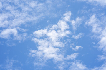 Beautiful cloudy blue sky background.