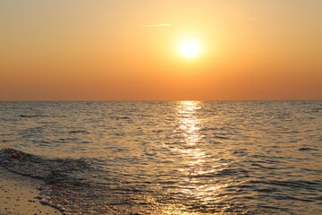yellow sunrise  on the beach