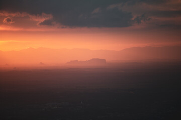 The soft evening sun hits the mountains in the evening.