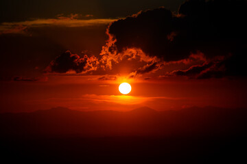 The soft evening sun hits the mountains in the evening.