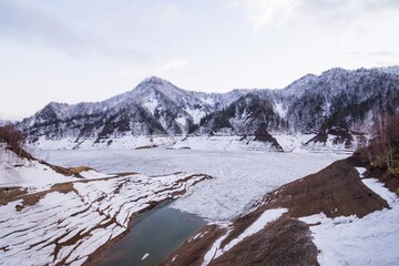 The panorama landscape photo of snow mountain in Hokkaido Japan.