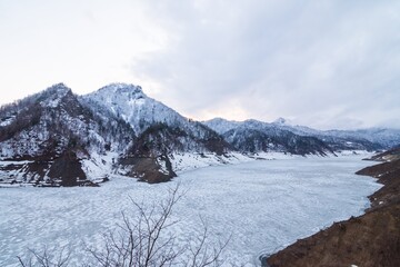 The panorama landscape photo of snow mountain in Hokkaido Japan.