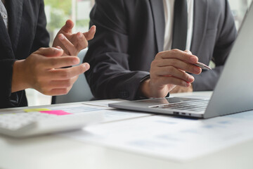 Business leaders talk about charts, financial graphs showing results are analyzing and calculating planning strategies, business success building processes