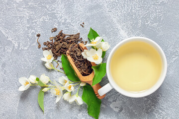 Tea with jasmine in a cup. Ceremony concept. Top view