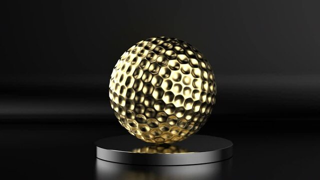 golden golf ball on black background