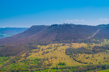 Germany, Panorama aerial drone view to breitenstein rock in swabian alb nature landscape near...